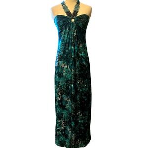 Turquoise floral print maxi dress that features a beaded strap at the neckline
